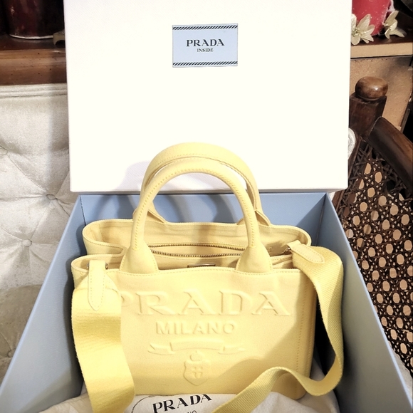 Prada Handbags - Authentic Prada Canapa embossed Logo 2 way bag